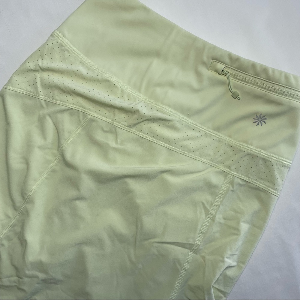 Athleta Pale Green Athletic Shorts with Zip Pocket